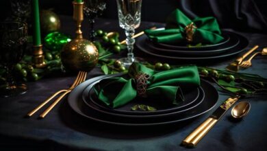 black table cloth green waterfall napkins gold charger